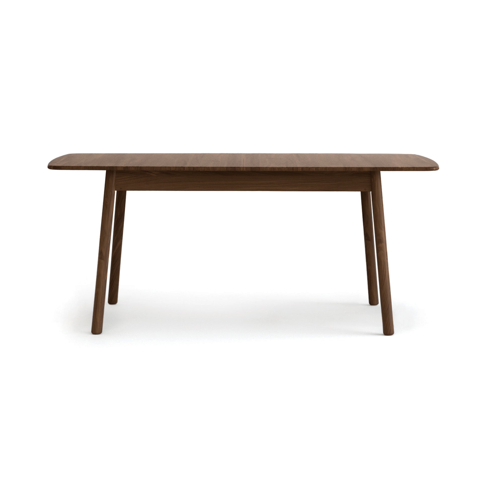 Copeland Baton Extension Dining Table with Mid-Century curves and angled legs, crafted in solid wood and American made.