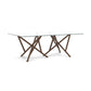 Baton Rectangular Glass Top Table by Copeland Furniture featuring striking intersecting angled legs and a contemporary, handcrafted American wood design.