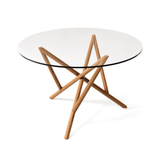 Baton Round Glass Top Table by Copeland Furniture with a striking geometric wood base, showcasing modern American craftsmanship.