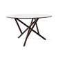 Baton Round Glass Top Table by Copeland Furniture featuring a smooth glass top and striking intersecting solid wood base, American made.