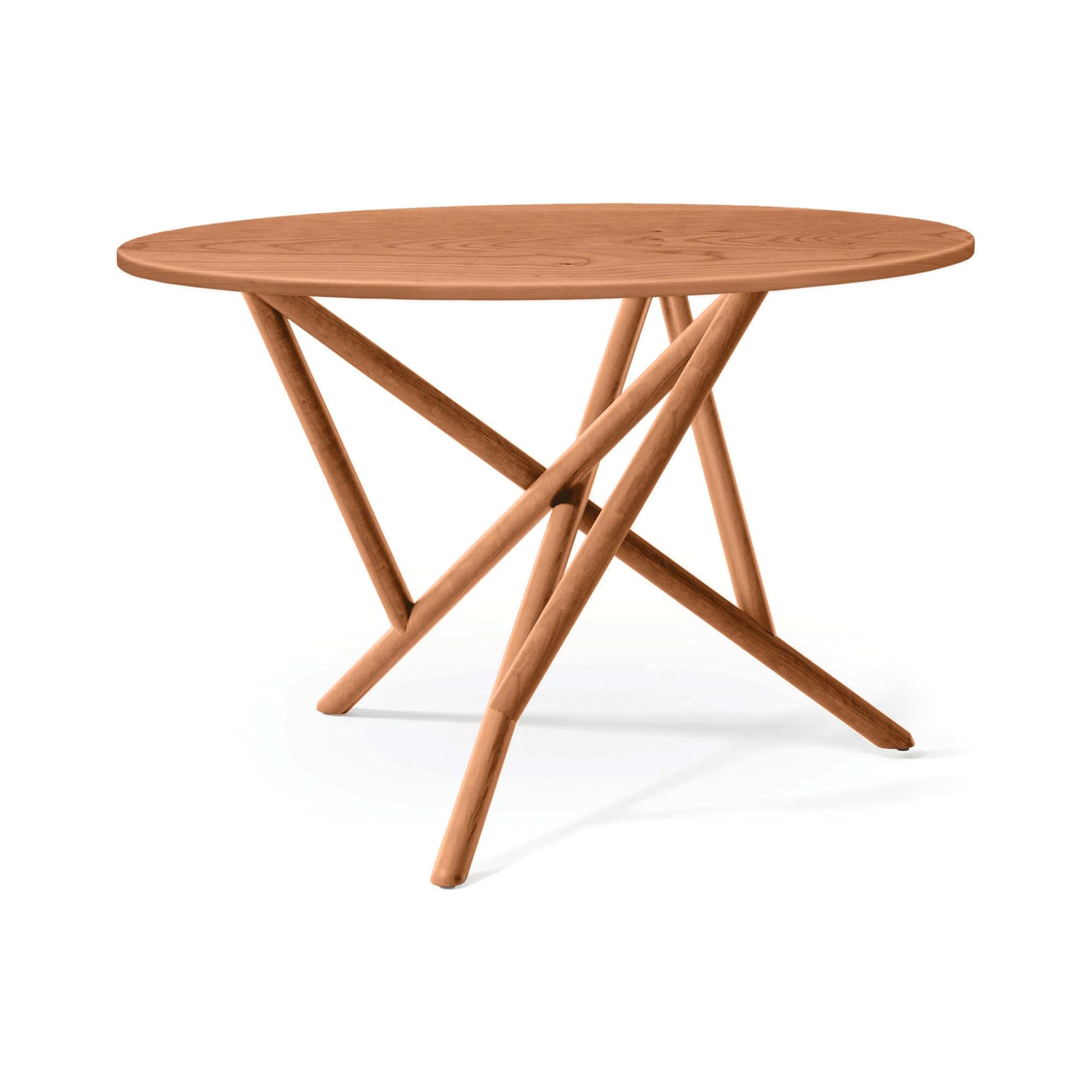 Baton Round Solid Top Dining Table by Copeland Furniture with a solid round wood top and unique four-leg base, American made quality craftsmanship.