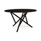 Copeland Furniture Baton Round Solid Top Dining Table with a dark round top and stylish crisscross legs, expertly crafted in America.