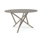 Baton Round Solid Top Dining Table by Copeland Furniture with a smooth grey top and four distinct angled crossing legs, American made craftsmanship.