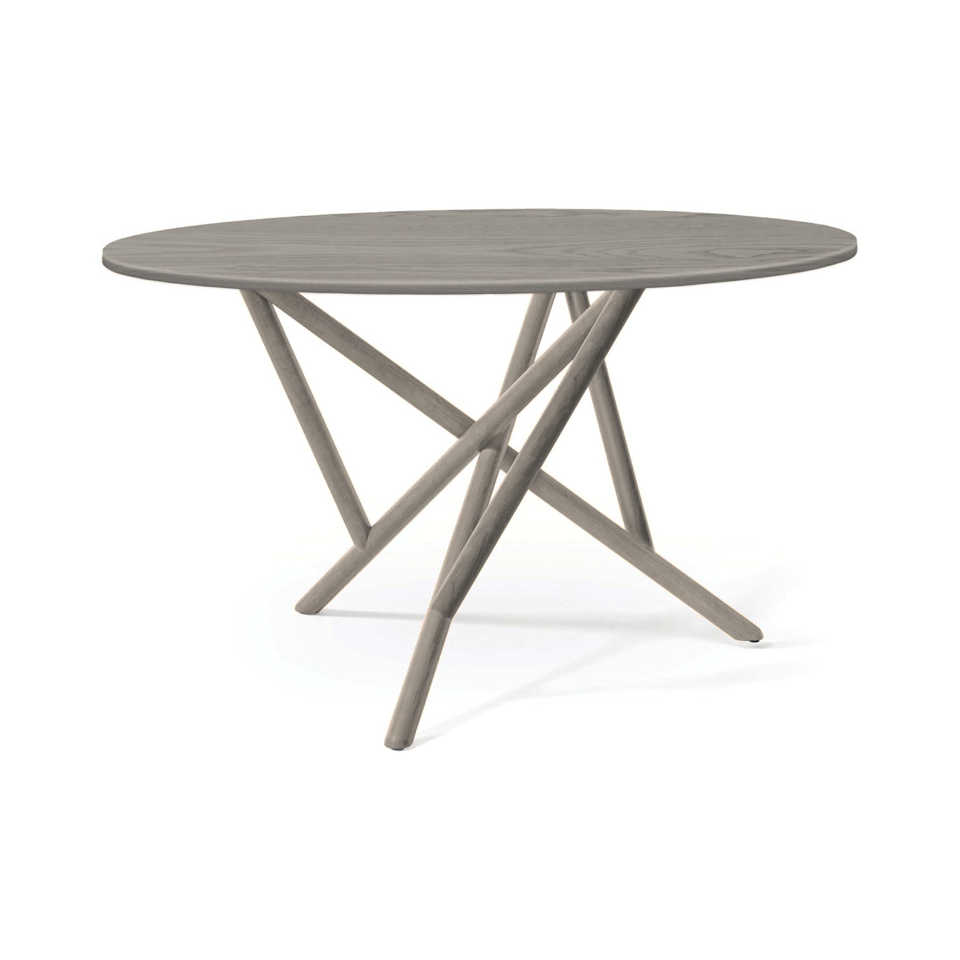 Baton Round Solid Top Dining Table by Copeland Furniture with a smooth grey top and four distinct angled crossing legs, American made craftsmanship.