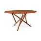 Baton Round Solid Top Dining Table by Copeland Furniture with a smooth round solid wood top and intersecting angled legs, handcrafted in Vermont.