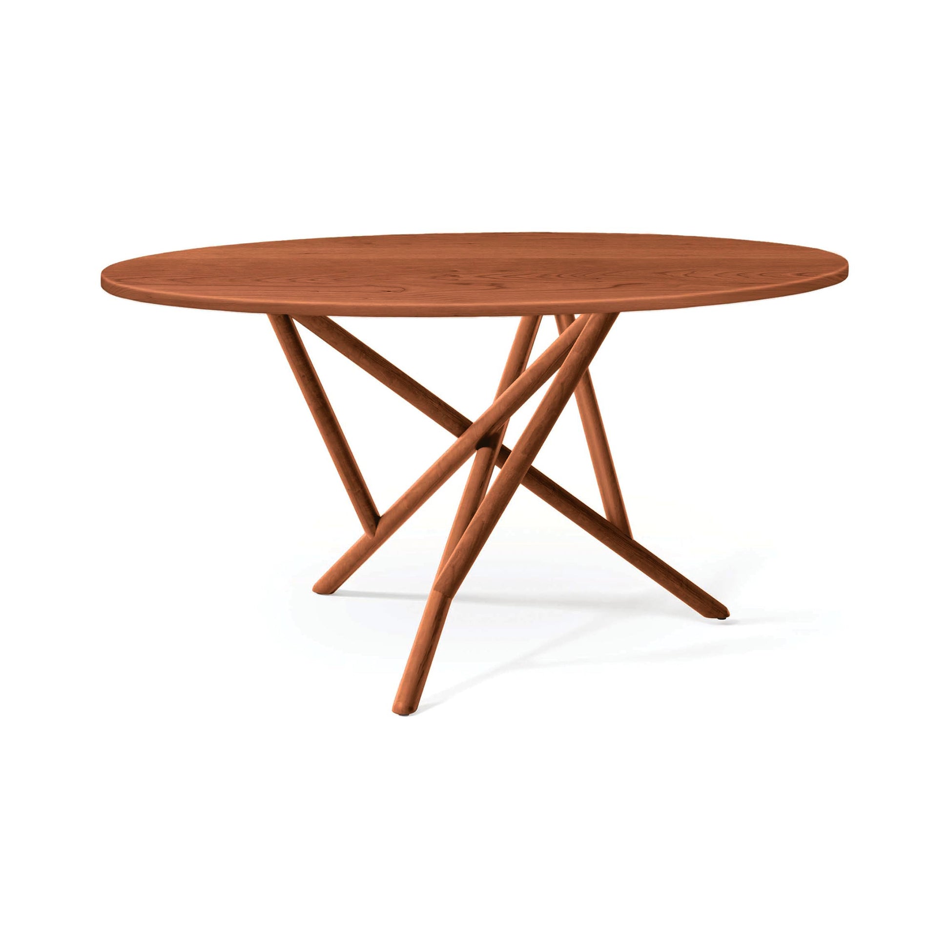 Baton Round Solid Top Dining Table by Copeland Furniture with a smooth round solid wood top and intersecting angled legs, handcrafted in Vermont.