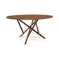 Baton Round Solid Top Dining Table by Copeland Furniture with modern angled intersecting legs, artisan-crafted from solid wood, American made.