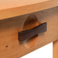 A close up of a Berkeley 1-Drawer Open Shelf Nightstand with a Copeland Furniture Asian Styling knob.