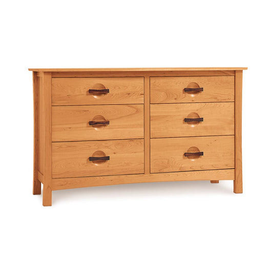 A handmade Berkeley 6-Drawer Dresser in cherry wood by Copeland Furniture on a plain background.