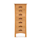 A tall, narrow wooden Copeland Furniture Berkeley 7-Drawer Lingerie Chest with seven drawers, each featuring a half-moon shaped handle, against a white background.