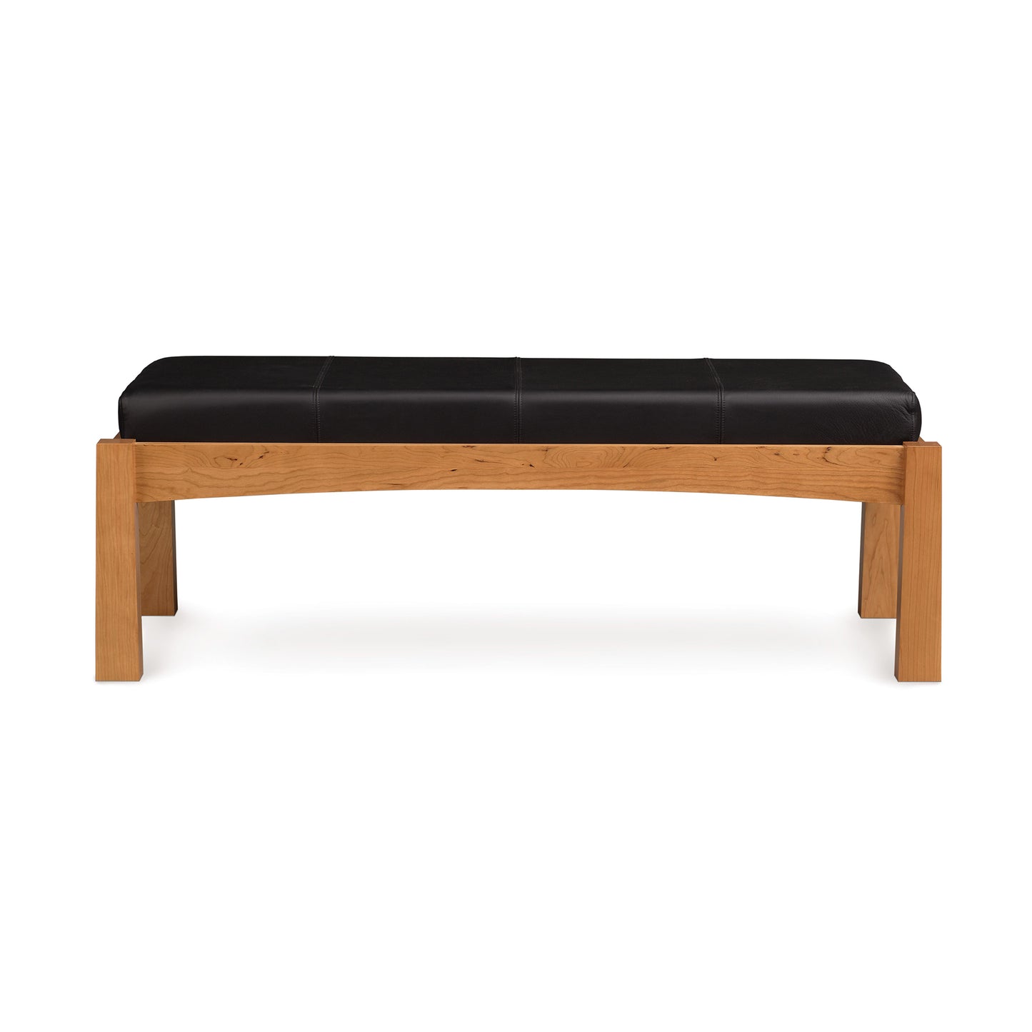 A modern Berkeley Upholstered Bench in cherry wood with a black leather seat, isolated on a white background by Copeland Furniture.