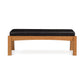 Copeland Furniture Berkeley Upholstered Bench with black cushioned seat and cherry wood frame, showcasing its sleek design.
