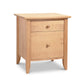 This Bow Front 1-Drawer Nightstand with Door from Lyndon Furniture features a classic design with two spacious drawers. Crafted from solid wood, it adds rustic charm to any bedroom setting.