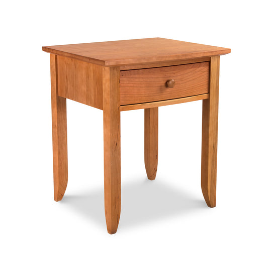 Bow Front 1-Drawer Nightstand by Lyndon Furniture, handcrafted from sustainable Vermont wood, highlighting its sleek design and quality craftsmanship.