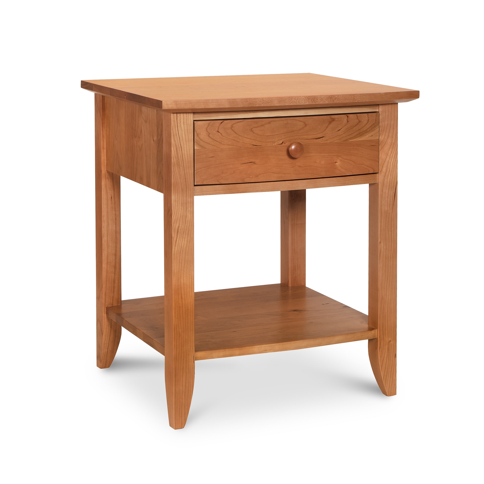 A Lyndon Furniture Bow Front 1-Drawer Open Shelf Nightstand with a drawer on top.