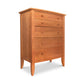A Lyndon Furniture Bow Front 5-Drawer Chest on a white background, made with hardwoods.
