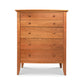 A Lyndon Furniture Bow Front 5-Drawer Chest made from hardwoods on a white background.