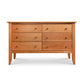 Handcrafted Bow Front 6-Drawer Dresser by Lyndon Furniture - Vermont Made Solid Wood Double Dresser with Natural Finish, Six Drawers, Round Knob Handles, and Tapered Legs.