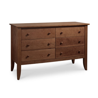 Lyndon Furniture Bow Front 6-Drawer Dresser made from sustainable wood, featuring elegant curves and fine craftsmanship.