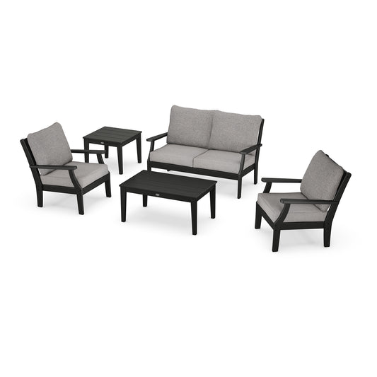 A POLYWOOD Braxton 5-Piece Deep Seating Set featuring a two-seater sofa, two armchairs, and a coffee table, all in black with gray cushions, displayed on a white background. This deep seating set is ideal.