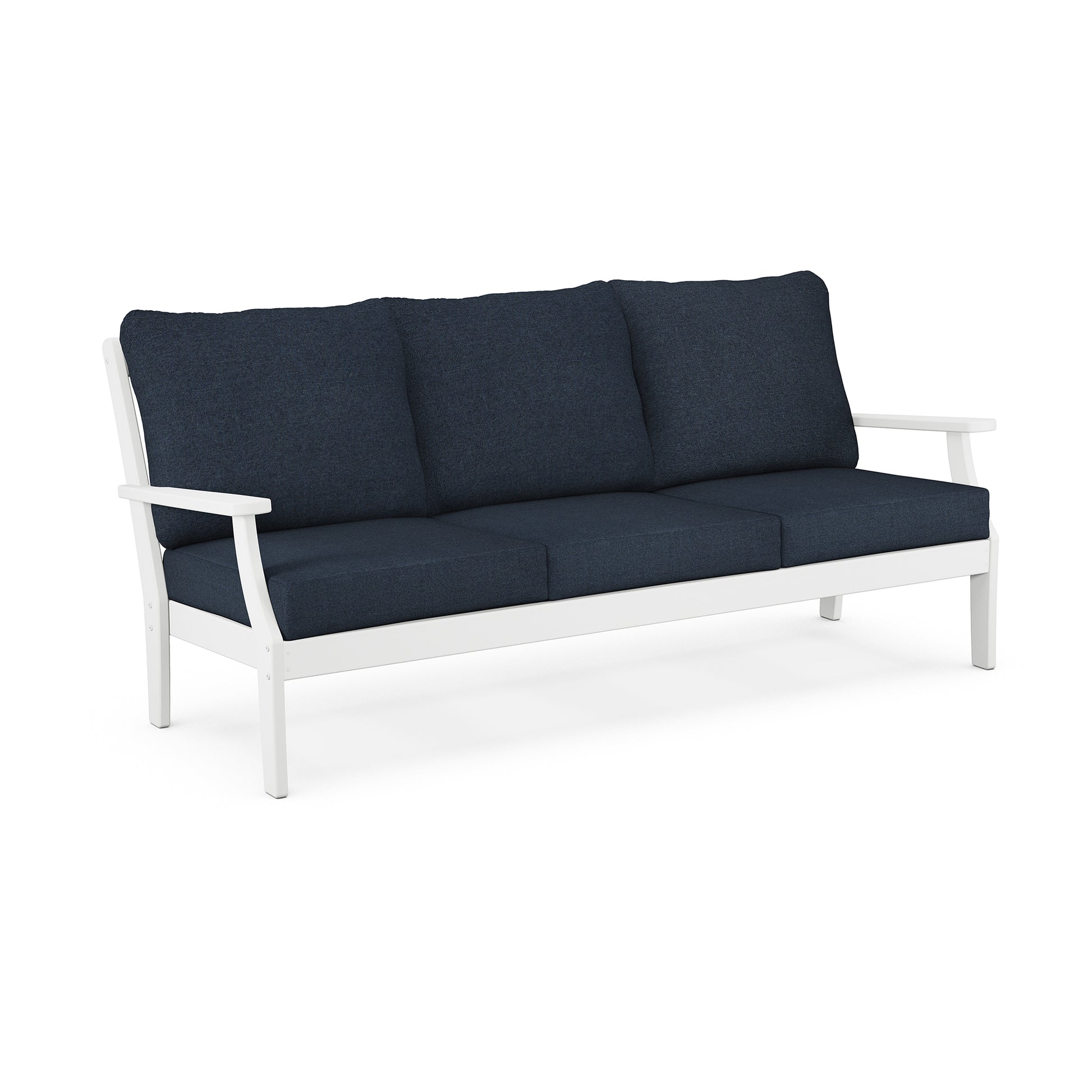 A modern three-seater outdoor sofa with a white POLYWOOD Braxton frame and deep blue cushions, isolated on a white background.