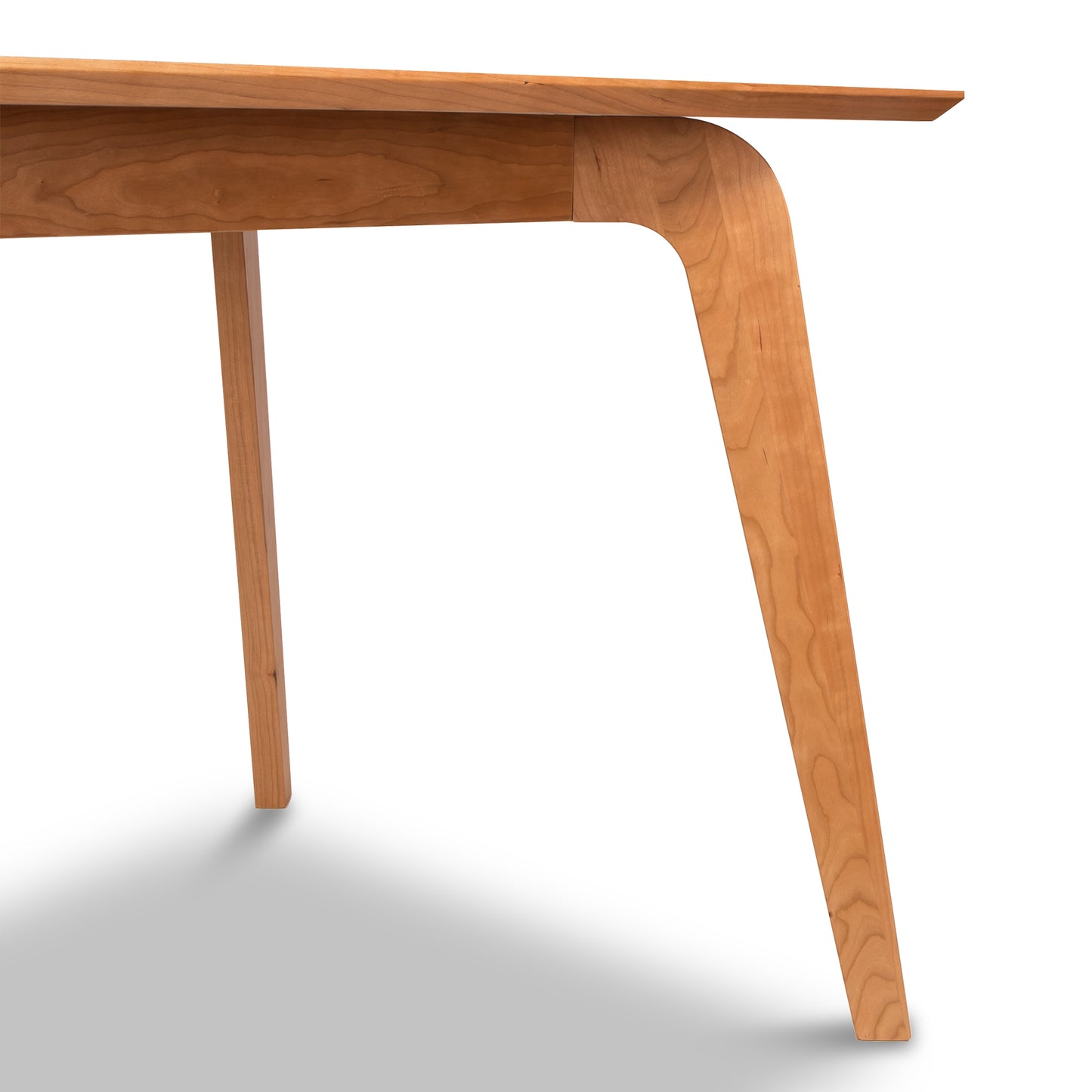 The Brighton Solid-Top Table - Floor Model by Lyndon Furniture is a beautiful addition to any mid-century modern home. With its solid wood construction and wooden leg, this table exudes both quality and style.