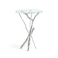 The Hubbardton Forge Brindille Accent Table is an exquisite occasional table that combines the elegance of glass and metal. The hand-hammered steel base of this unique piece showcases delicate branches for a natural and