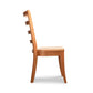 Bromley Ladder-Back Chair by Vermont Woods Studios with wood seat and straight legs, highlighted in profile to showcase fine American craftsmanship.