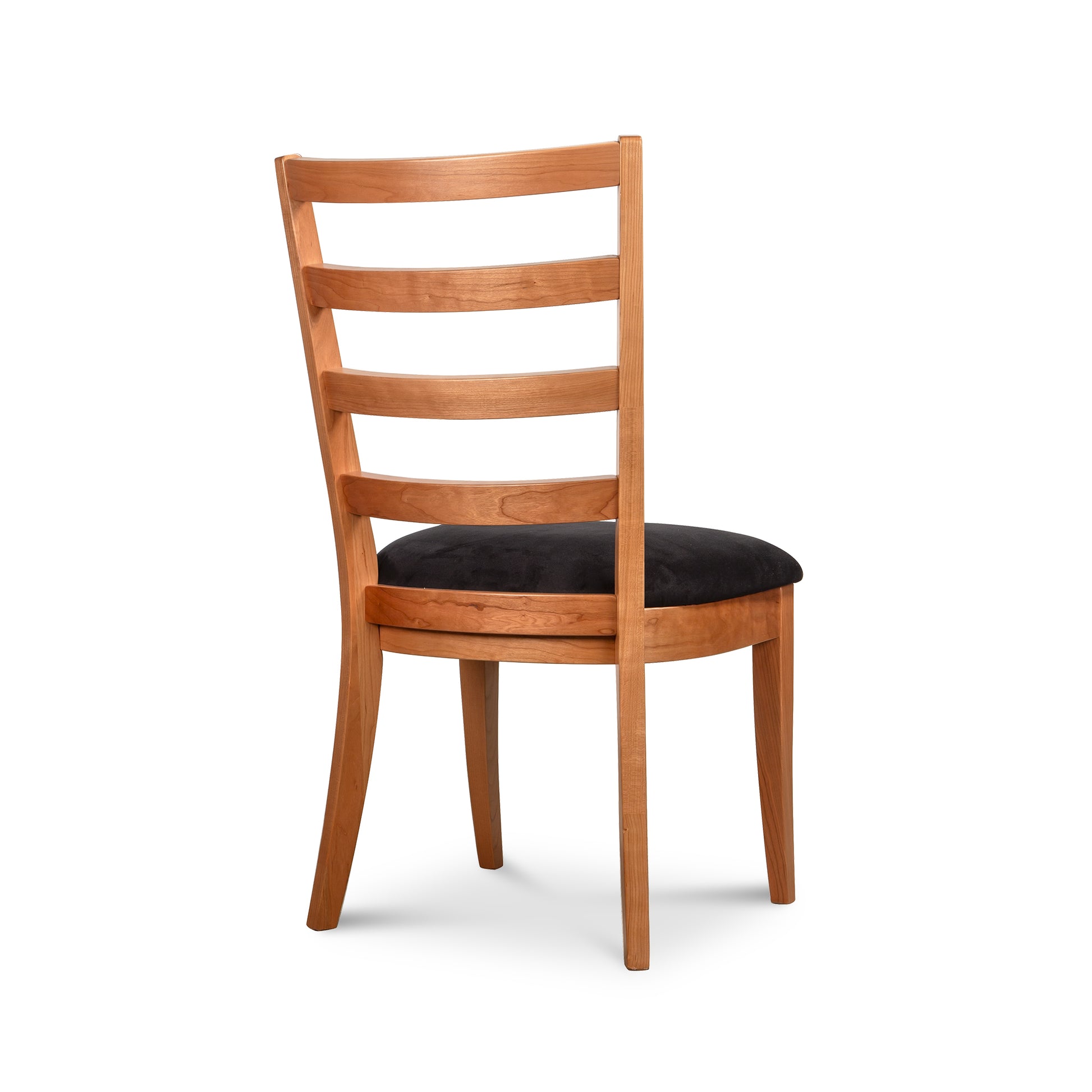 Bromley Ladder-Back Chair by Vermont Woods Studios crafted from natural wood with a black upholstered seat, highlighting American-made quality.