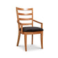 Bromley Ladder-Back Chair by Vermont Woods Studios crafted in natural wood with a black upholstered seat, highlighting fine American craftsmanship.