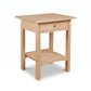 Burlington Shaker 1-Drawer Open Shelf Nightstand in light wood by Vermont Furniture Designs, showcasing quality American craftsmanship.