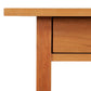 A close up of a Vermont Furniture Designs Burlington Shaker 2-Drawer Coffee Table.