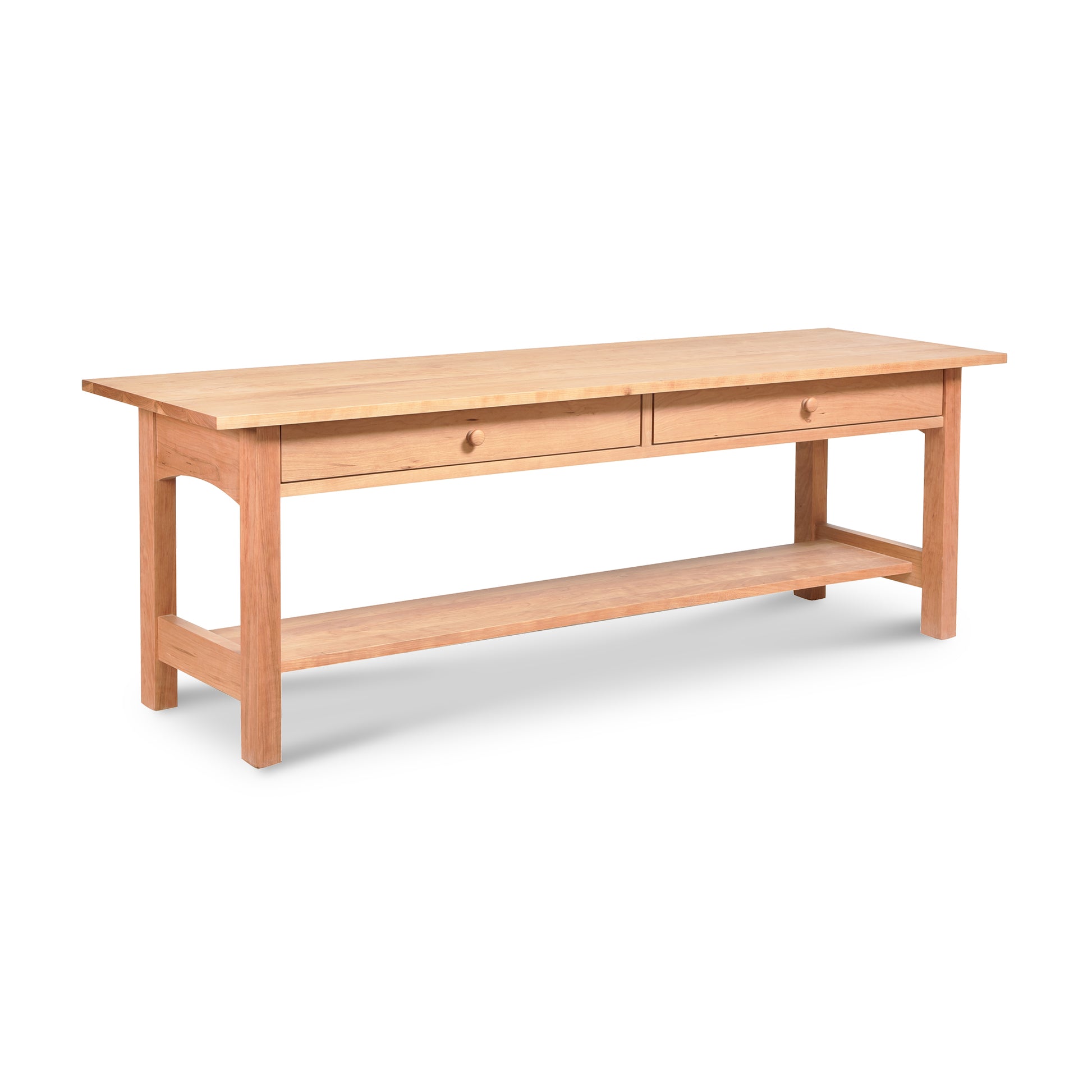 Vermont Furniture Designs Burlington Shaker 2-Drawer Coffee Table with a lower shelf, isolated on a white background.