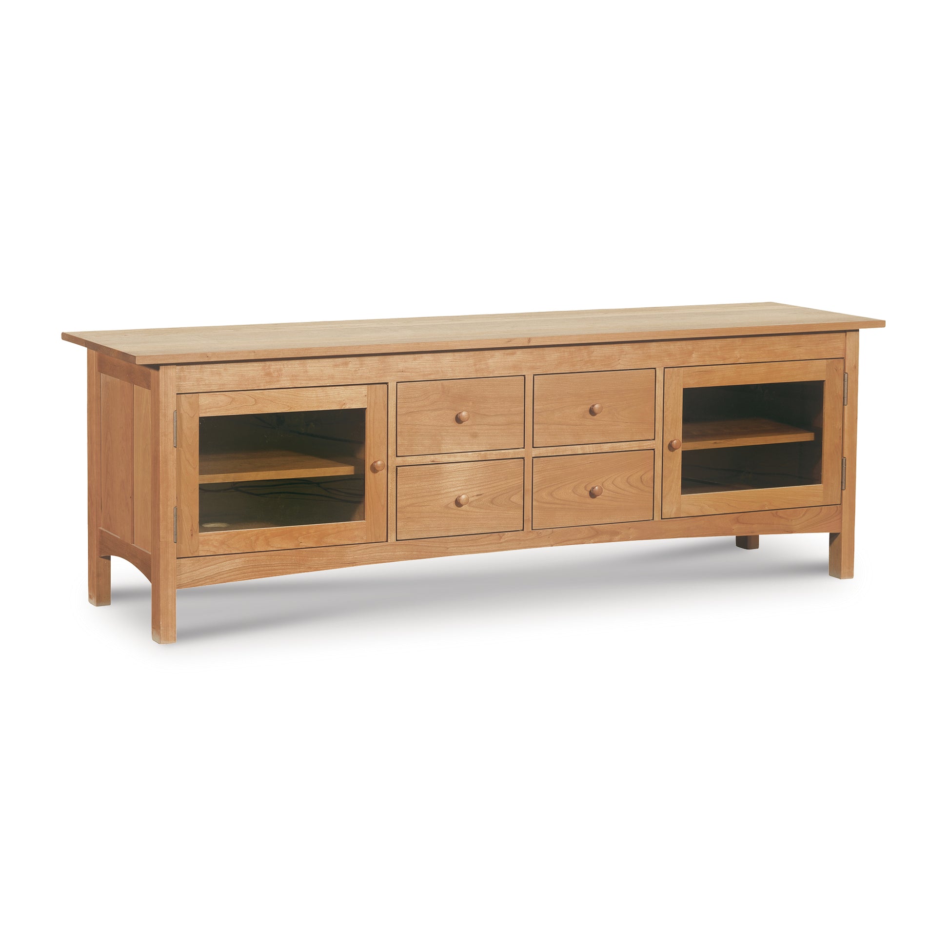 Handcrafted solid wood Vermont Furniture Designs Burlington Shaker 4-Drawer Media Console with multiple compartments and drawers, against a white background.
