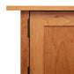 Close-up of a Vermont Furniture Designs Burlington Shaker 8-Drawer 2-Door Dresser door and its frame showing the hinge detail.