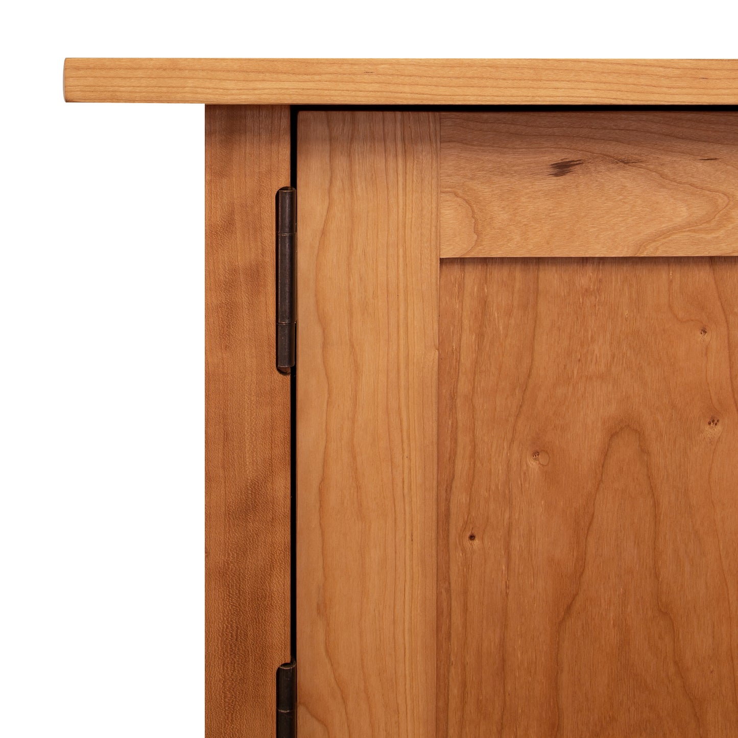 A close up of a Vermont Furniture Designs Burlington Shaker 8-Drawer 2-Door Dresser cabinet door.