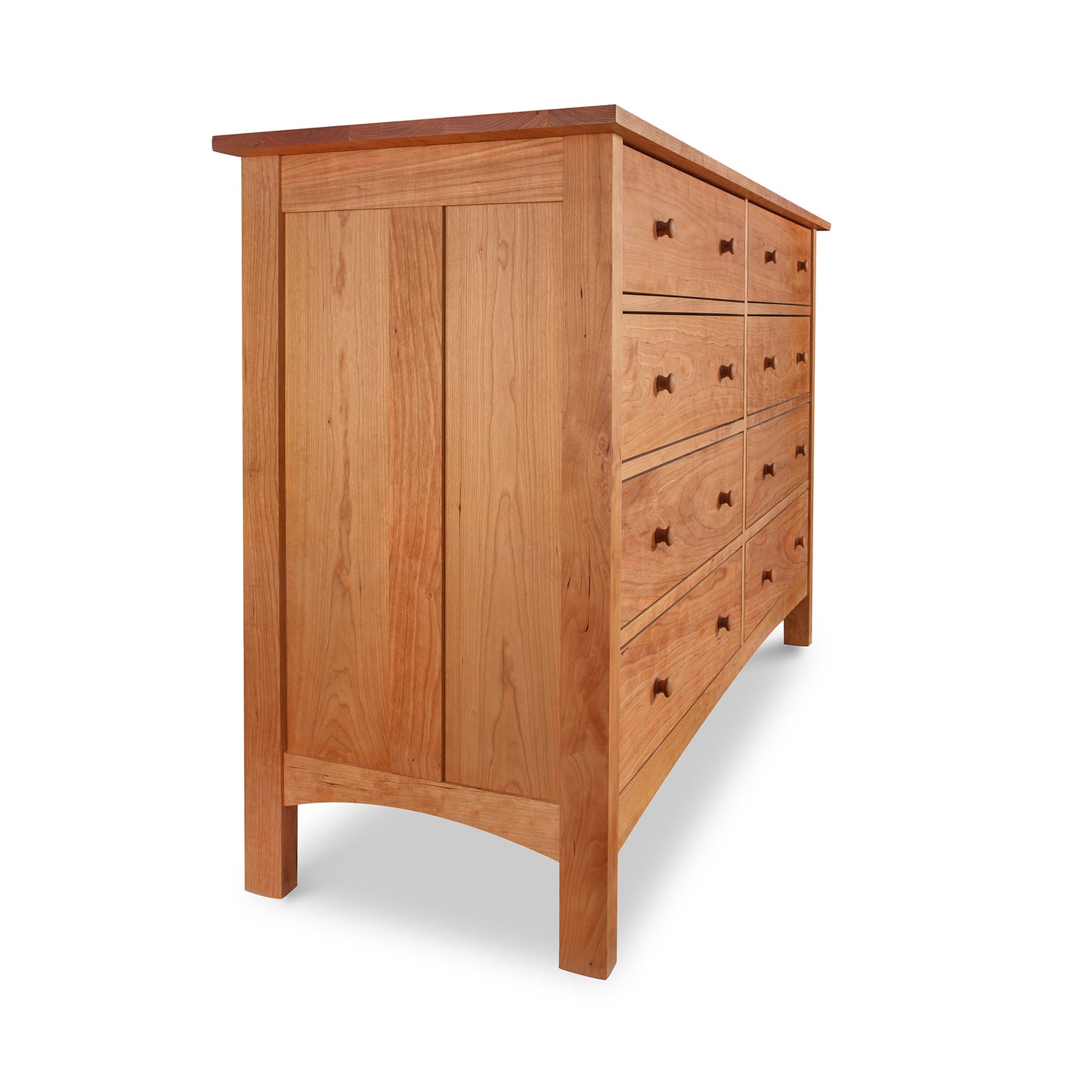 A Burlington Shaker 8-Drawer Dresser #1 by Vermont Furniture Designs with drawers on a white background in Vermont.