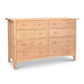 A Burlington Shaker 8-Drawer Dresser #1 by Vermont Furniture Designs with drawers on a white background.