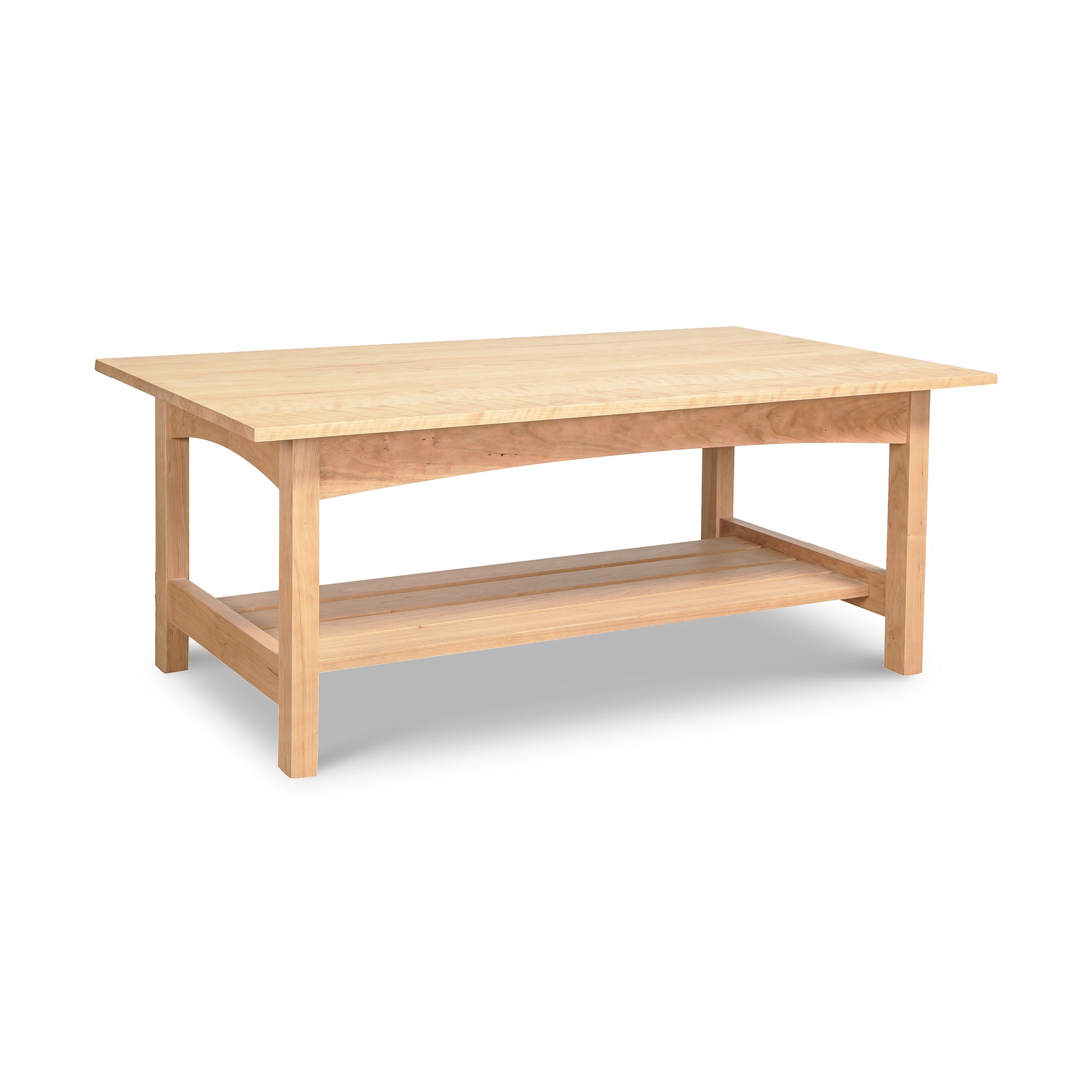 A handmade Vermont Furniture Designs Burlington Shaker coffee table crafted from solid wood, featuring a shelf on top.