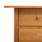 Part of a Burlington Shaker Executive Desk with two drawers, featuring a simple knob on the top drawer, set against a white background from Vermont Furniture Designs.