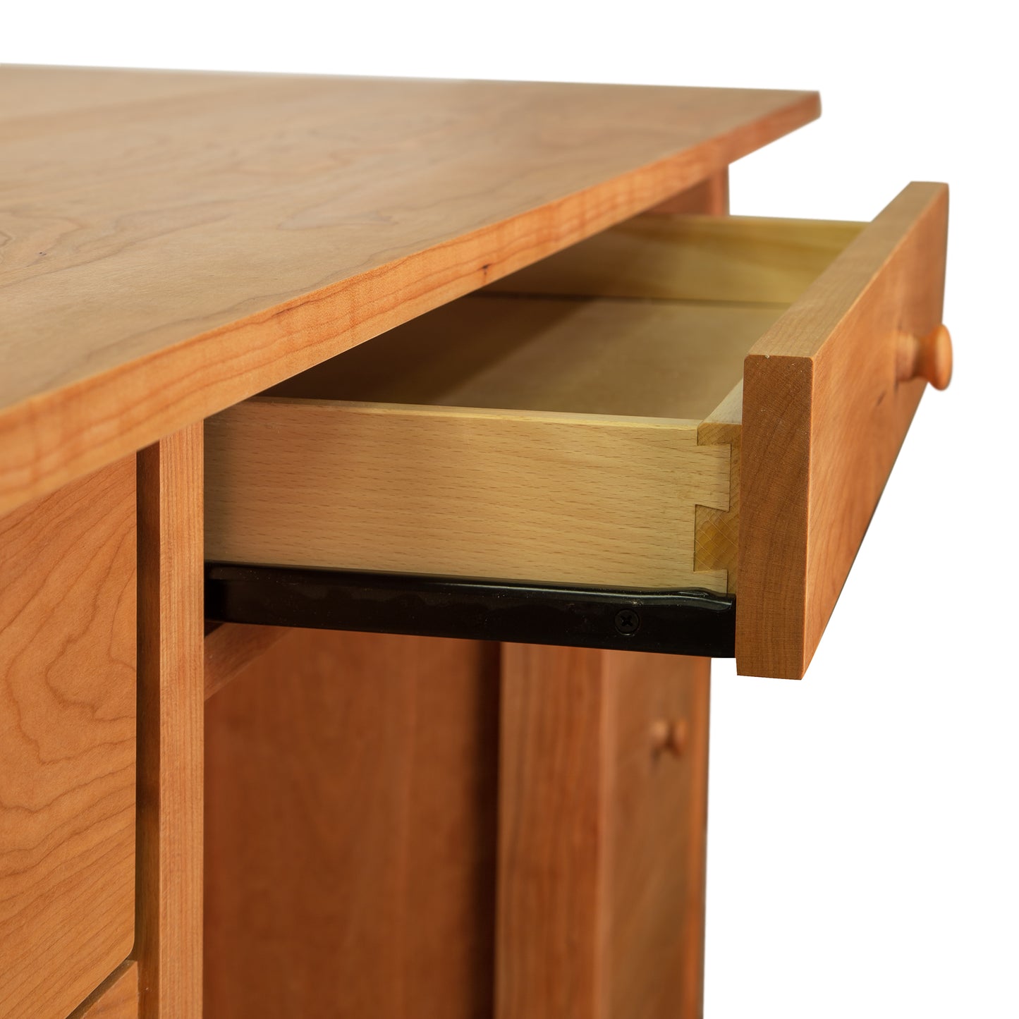 A drawer is open on a Vermont Furniture Designs Burlington Shaker Executive Desk - Floor Model.