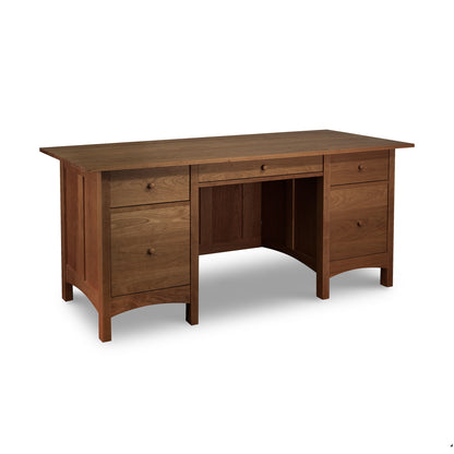 Burlington Shaker Executive Desk with solid wood construction, featuring a flat top, eight side drawers, and a central seating area. Handcrafted by Vermont Furniture Designs.