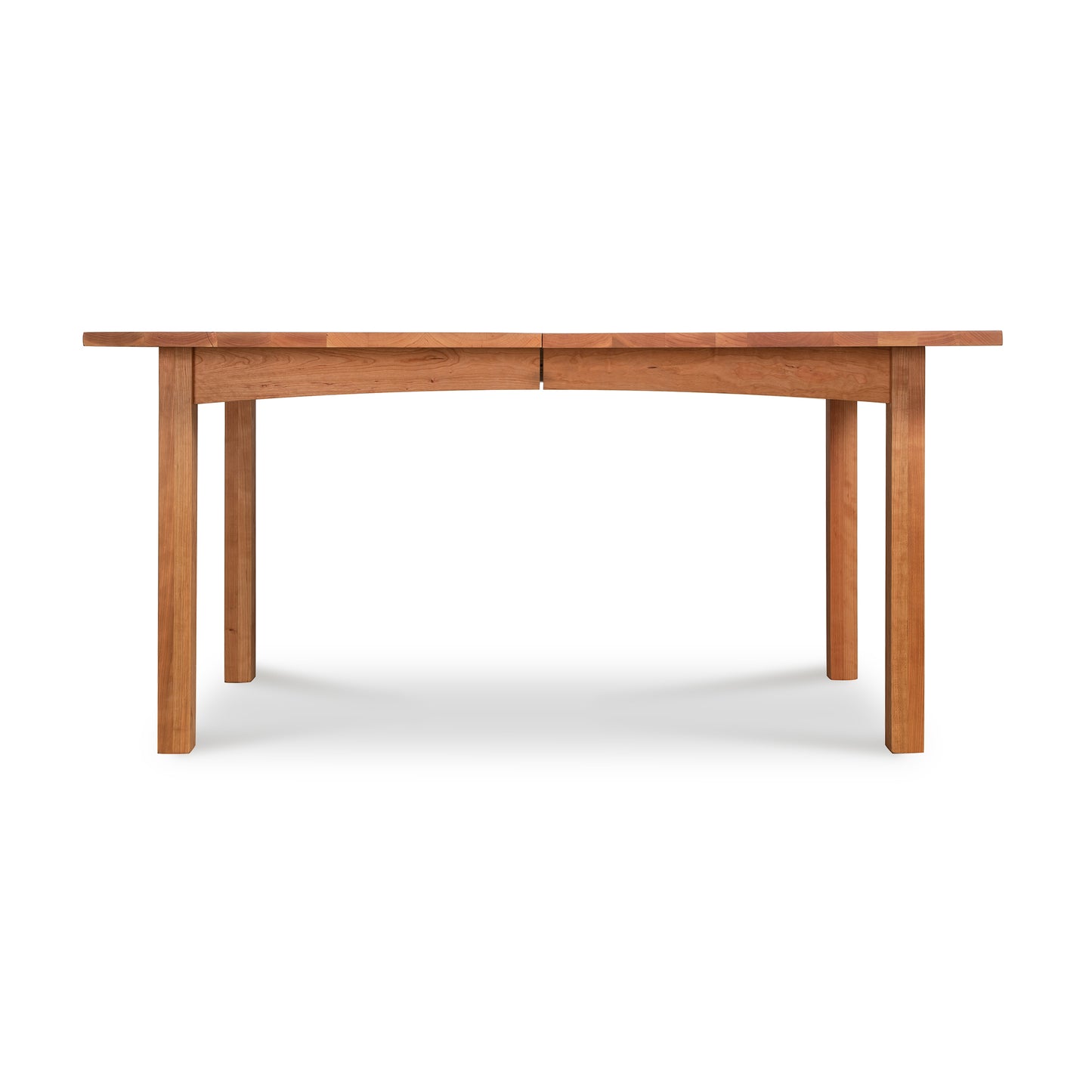 A Burlington Shaker Extension Dining Table by Vermont Furniture Designs, with solid hardwood construction, featuring straight legs and a smooth, rectangular tabletop, displayed against a white background.