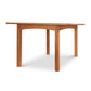 A wooden table with a rectangular top and four straight legs. Crafted by Vermont Furniture Designs, the Burlington Shaker Extension Dining Table - 40"x60" (Floor Model) showcases a natural wood finish and an eco-friendly oil finish. It features a slightly arched support structure beneath the tabletop, positioned against a white background.