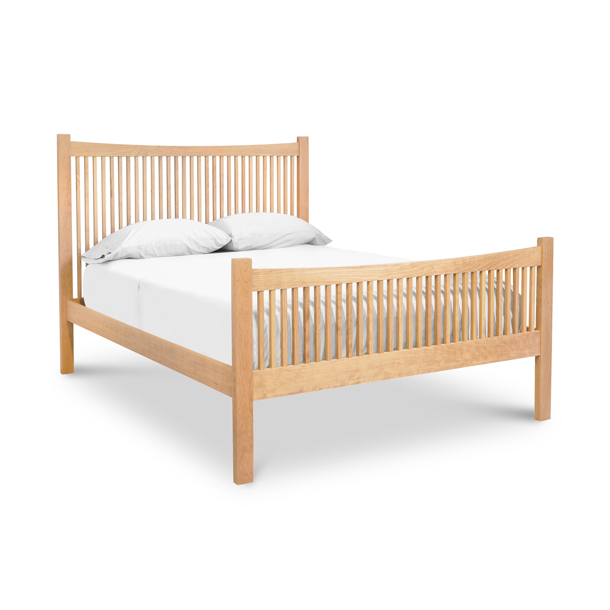 A high-end Vermont Furniture Designs Burlington Shaker High Footboard bed made with solid maple wood, featuring white sheets.
