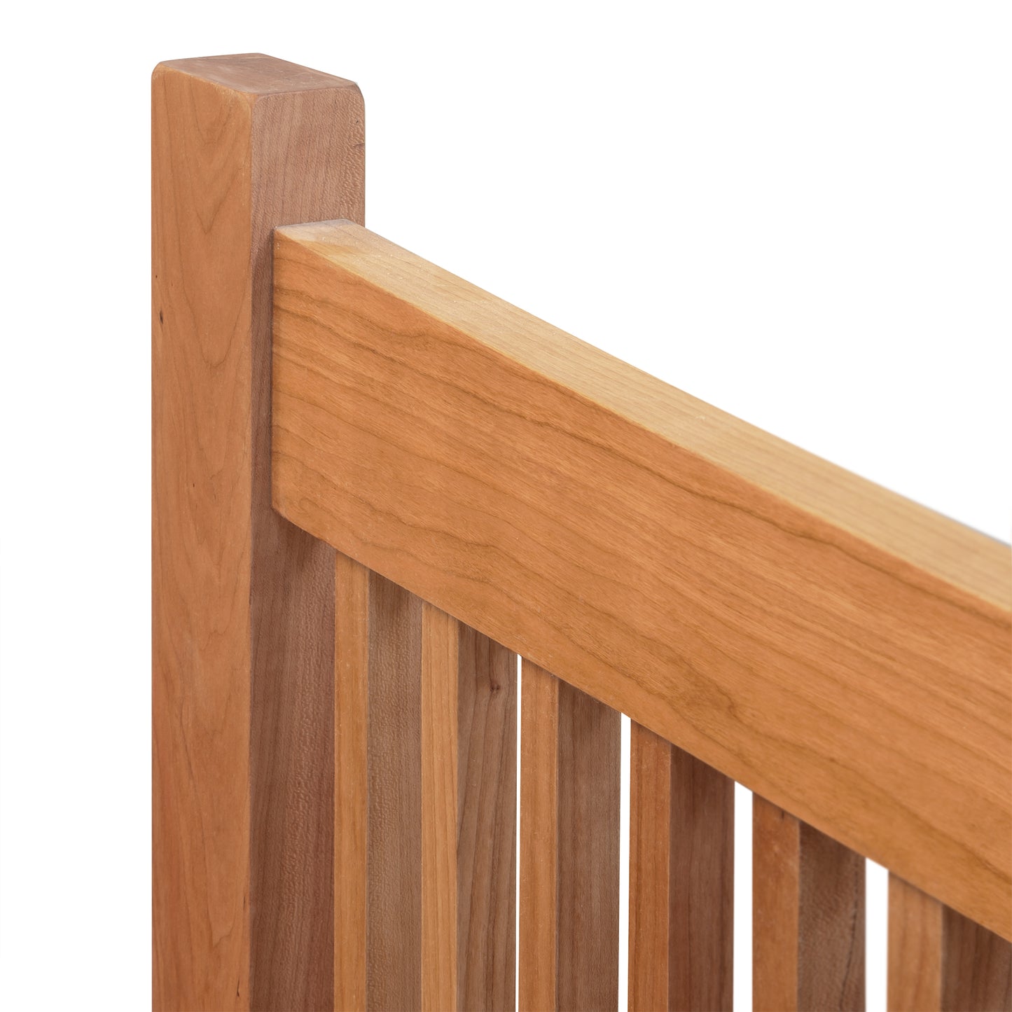 Close-up of Burlington Shaker High Footboard Bed by Vermont Furniture Designs, highlighting the expertly crafted slats and smooth natural wood finish.