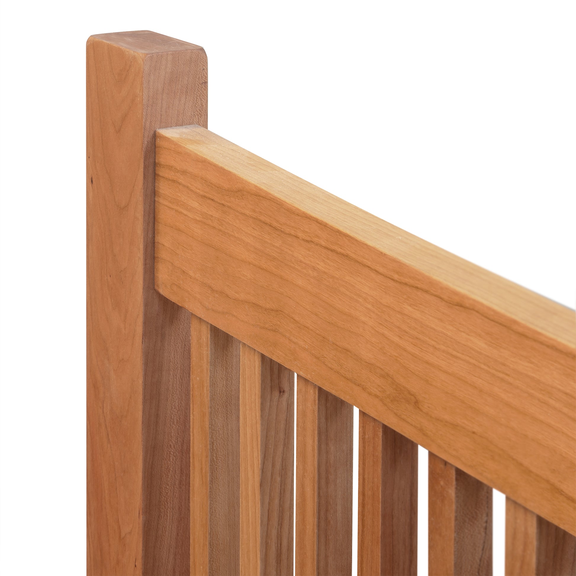Close-up of Burlington Shaker High Footboard Bed by Vermont Furniture Designs, highlighting the expertly crafted slats and smooth natural wood finish.