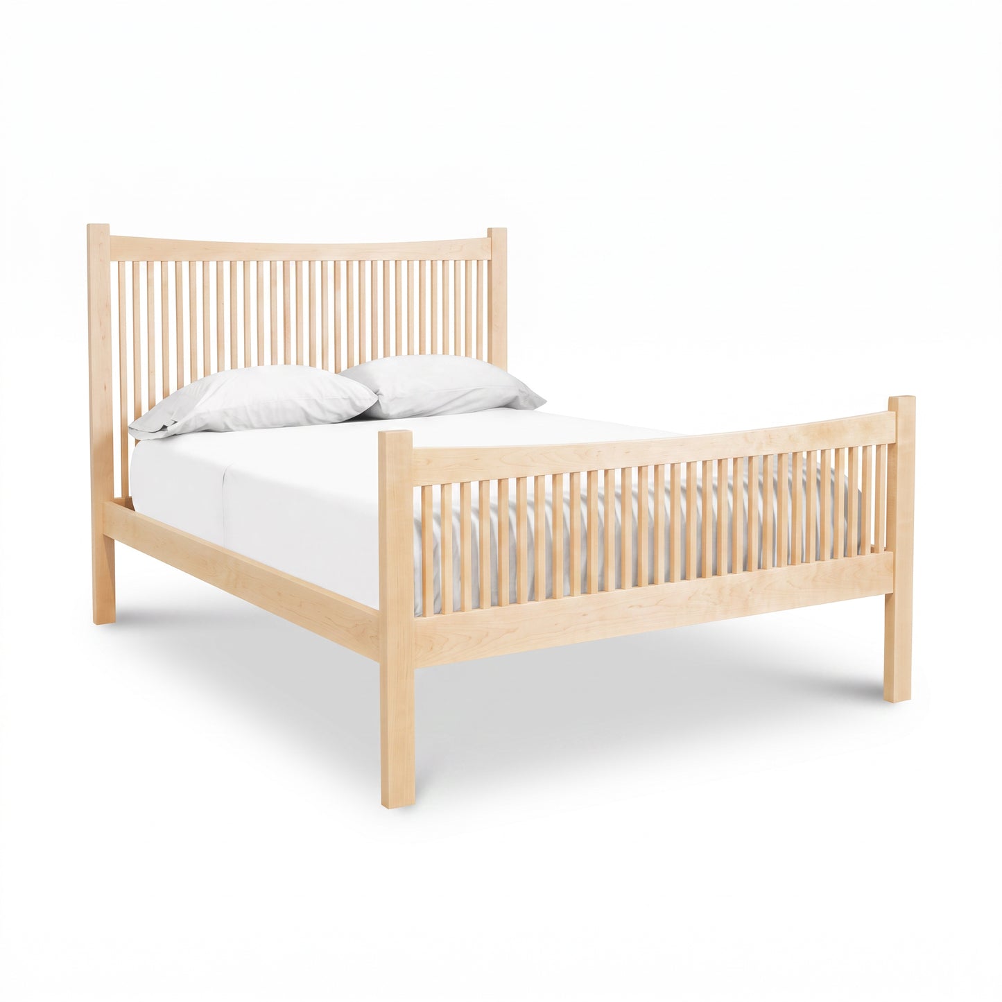 Burlington Shaker High Footboard Bed by Vermont Furniture Designs in light wood with vertical slats, shown with white bedding and two pillows.