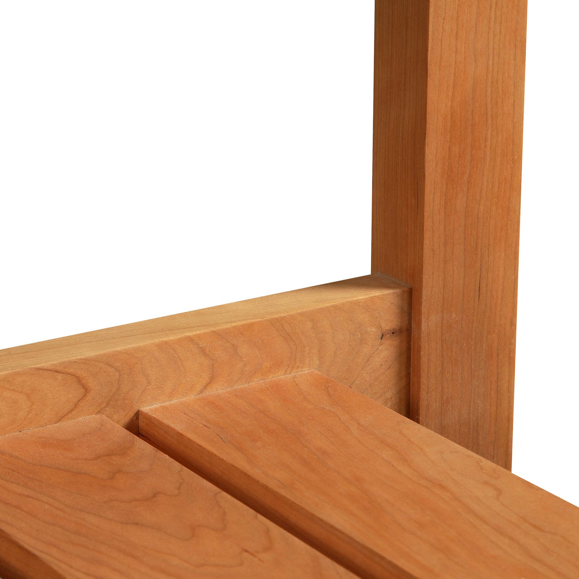 Close-up of a wooden frame corner from the Vermont Furniture Designs Burlington Shaker Lamp Table showing the grain and joints.