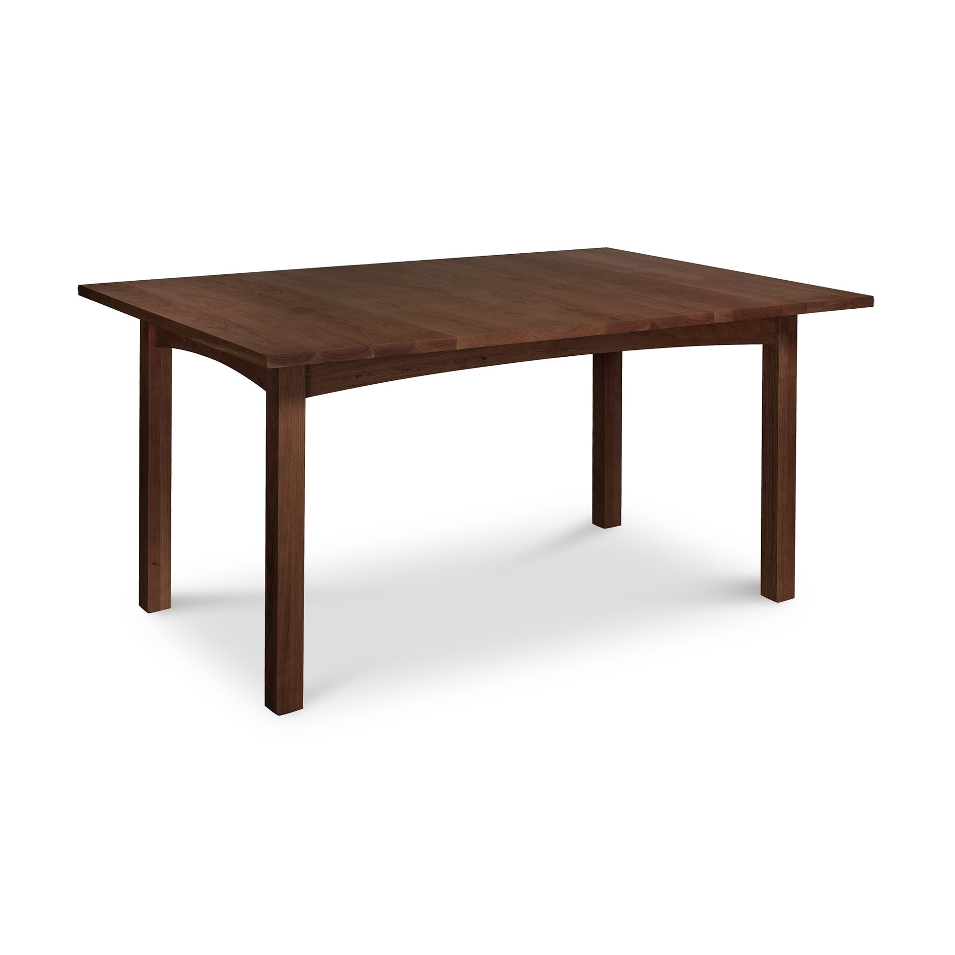 A rectangular Burlington Shaker Solid Top Dining Table with four legs, isolated on a white background, from Vermont Furniture Designs.
